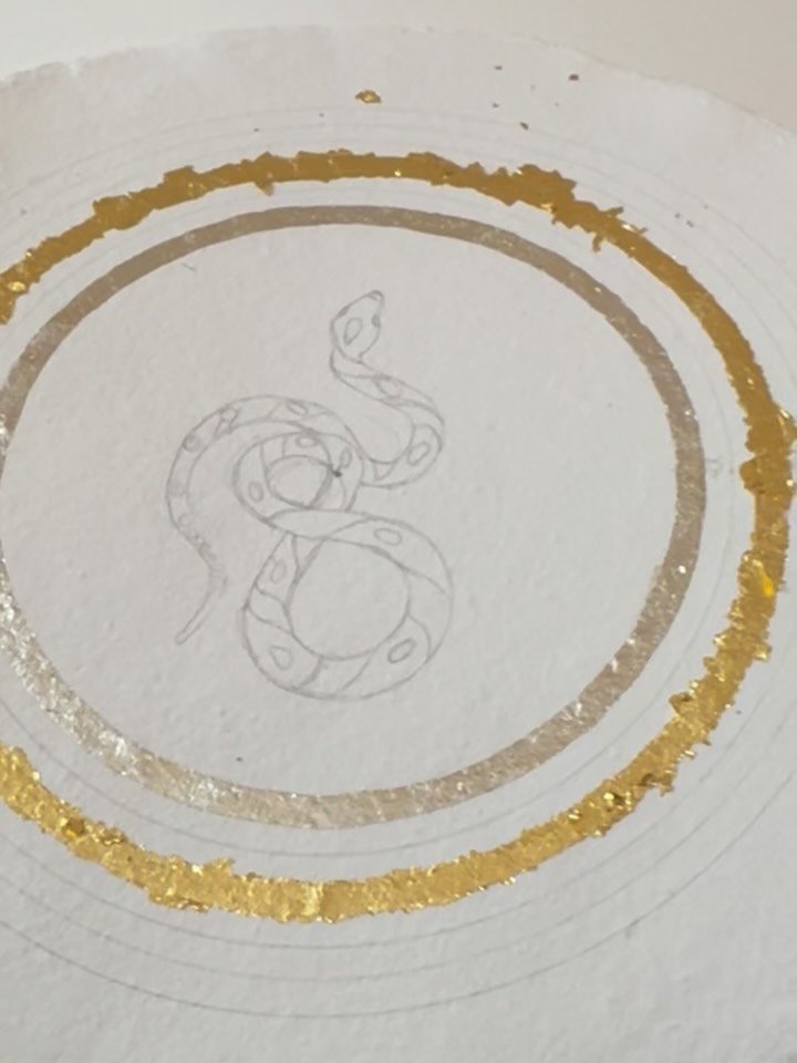 Gold leafing a new painting. Gold is precious and thanks to the ever-increasing price of gold it&rsquo;s even more essential to keep those tiny scraps of gold leaf. What happens to them? They can be turned into 24 carat watercolour paint known as she