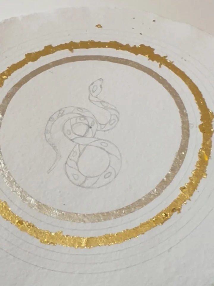 Gold leafing a new painting. Gold is precious and thanks to the ever-increasing price of gold it&rsquo;s even more essential to keep those tiny scraps of gold leaf. What happens to them? They can be turned into 24 carat watercolour paint known as she