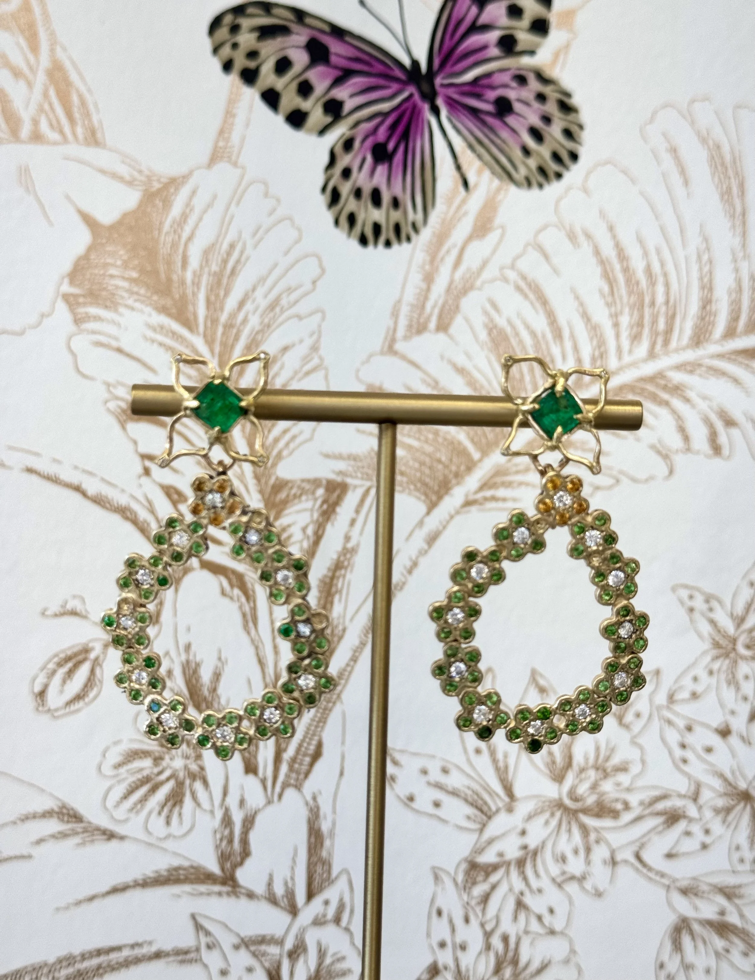 +emerald+earrings+on+stand.jpg