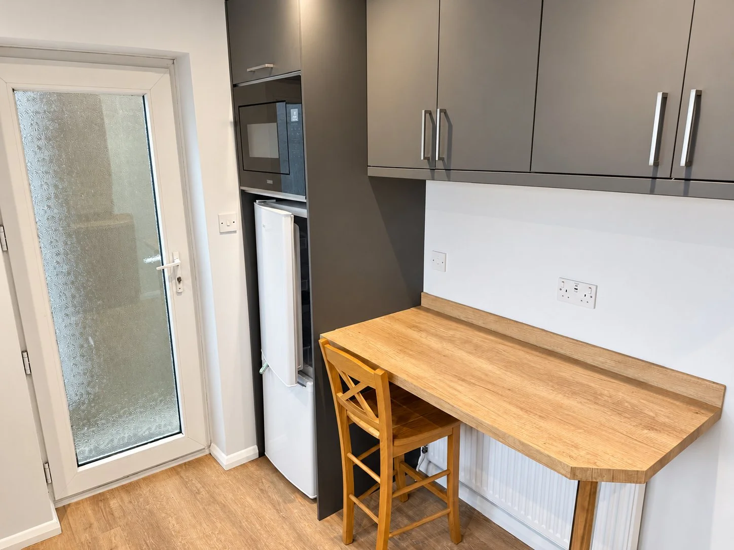 11_Kitchen_Breakfast_Bar_Enhanced.jpg