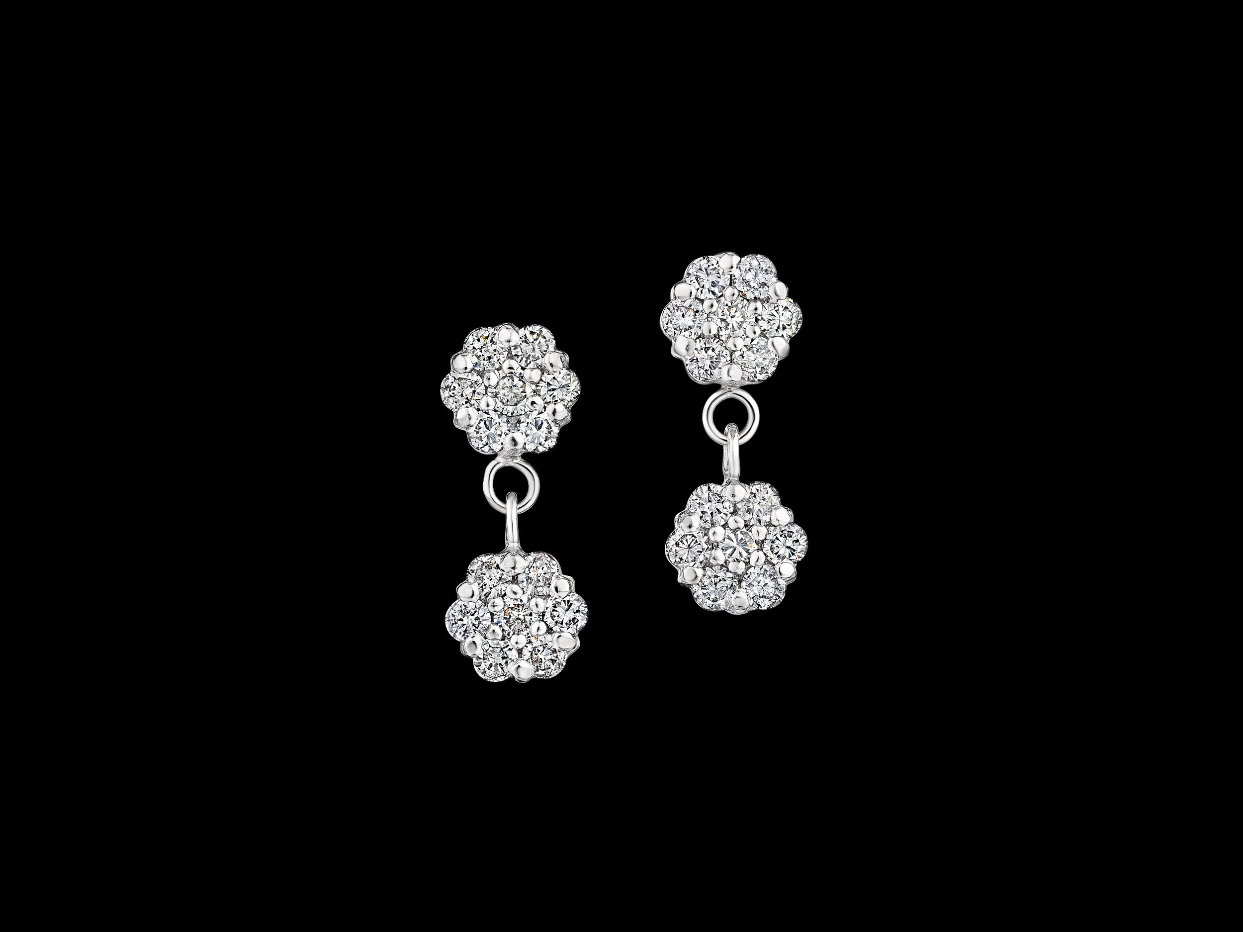 White gold diamond cluster earrings.