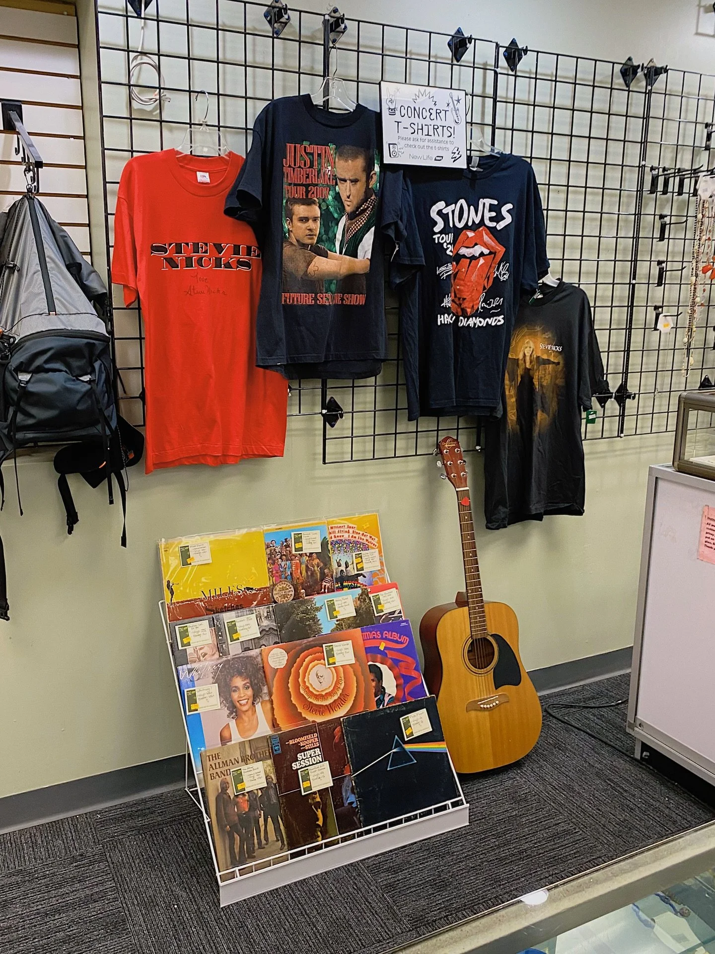 🎸Happy Friday! 🤘 Have you seen our new display behind the jewelry counter at our 📍Glenside location?! Our manager, Michelle, has been curating a space just for awesome concert t-shirts. Be sure to check this spot every time you visit if you are a 