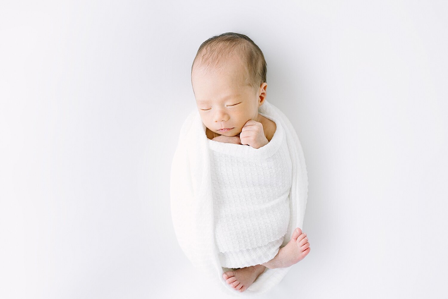 Newborn photos in studio in Orange County with Ambre Williams Photography.