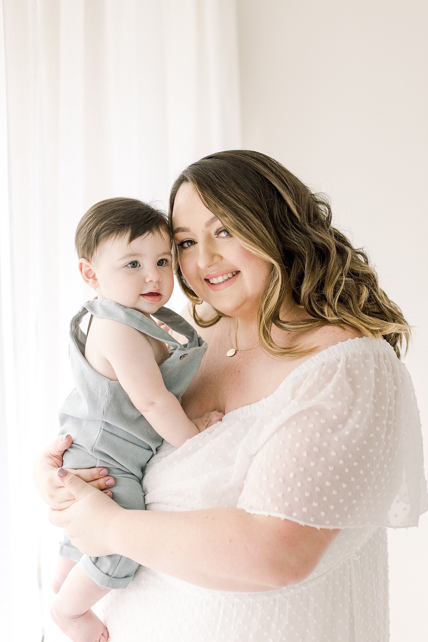 Mother-son photo taken in studio by Ambre Williams Photography.