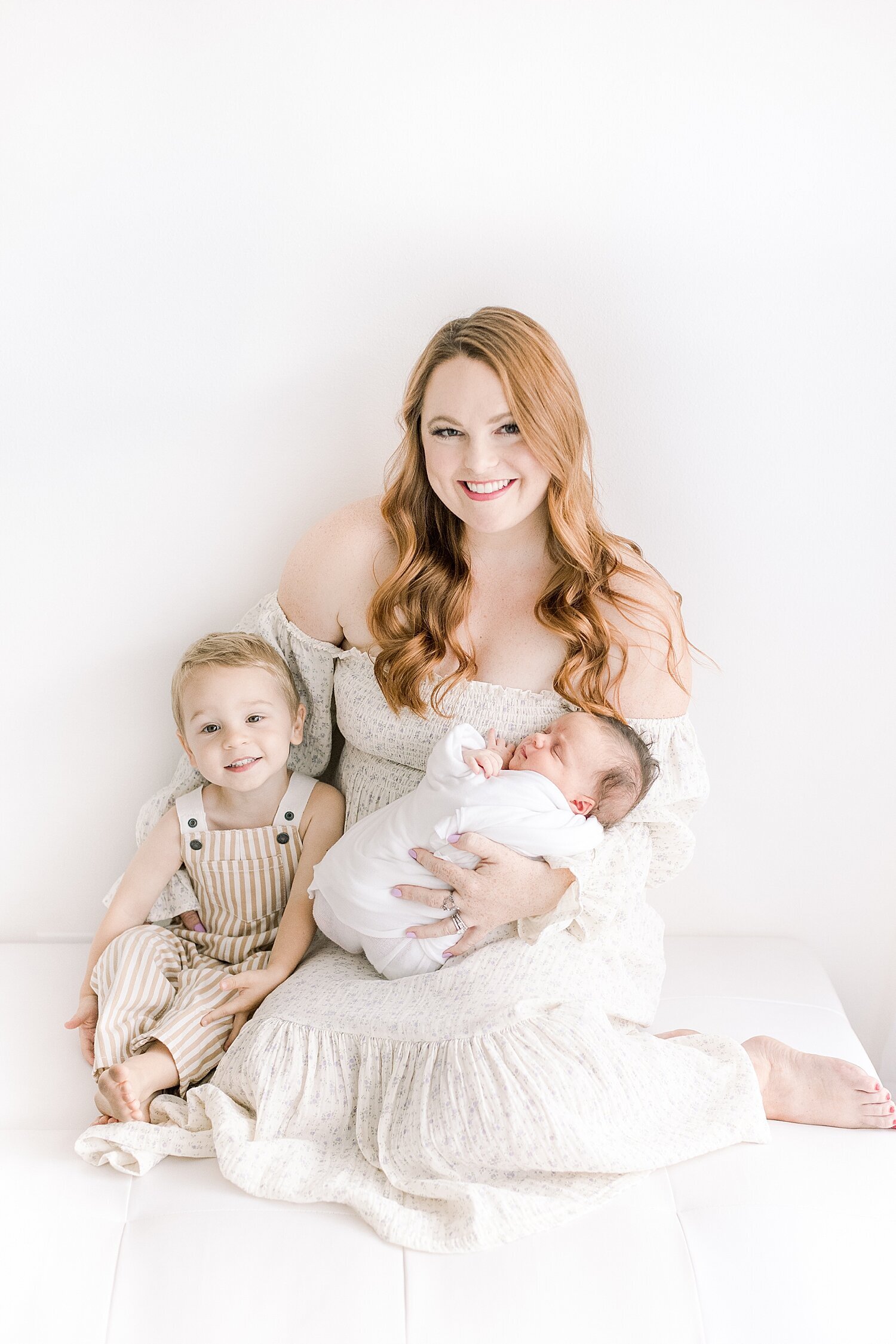 Photo of mom, son and newborn baby girl. Photo by Ambre Williams Photography.