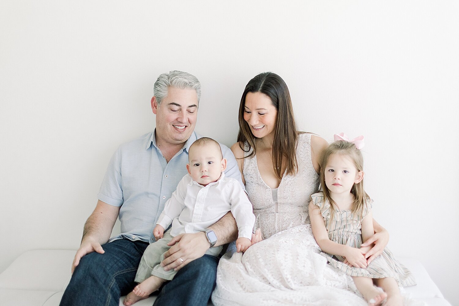 Family portrait in Newport Beach Studio during baby boy's first birthday session with Ambre Williams Photography.