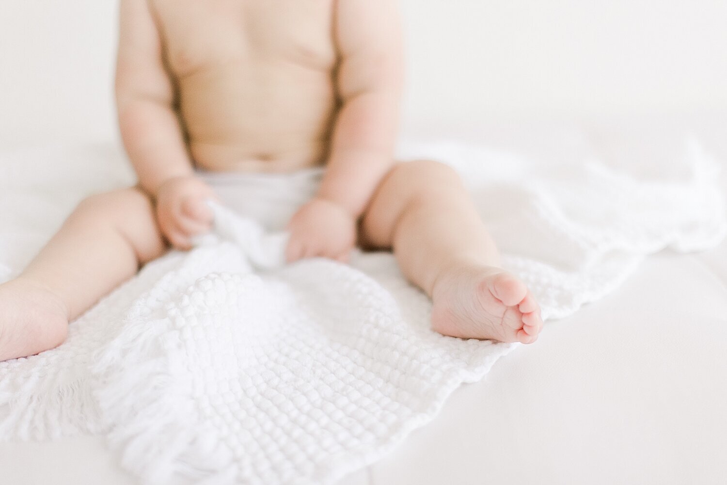 Baby details of one year old. Photo by Ambre Williams Photography.