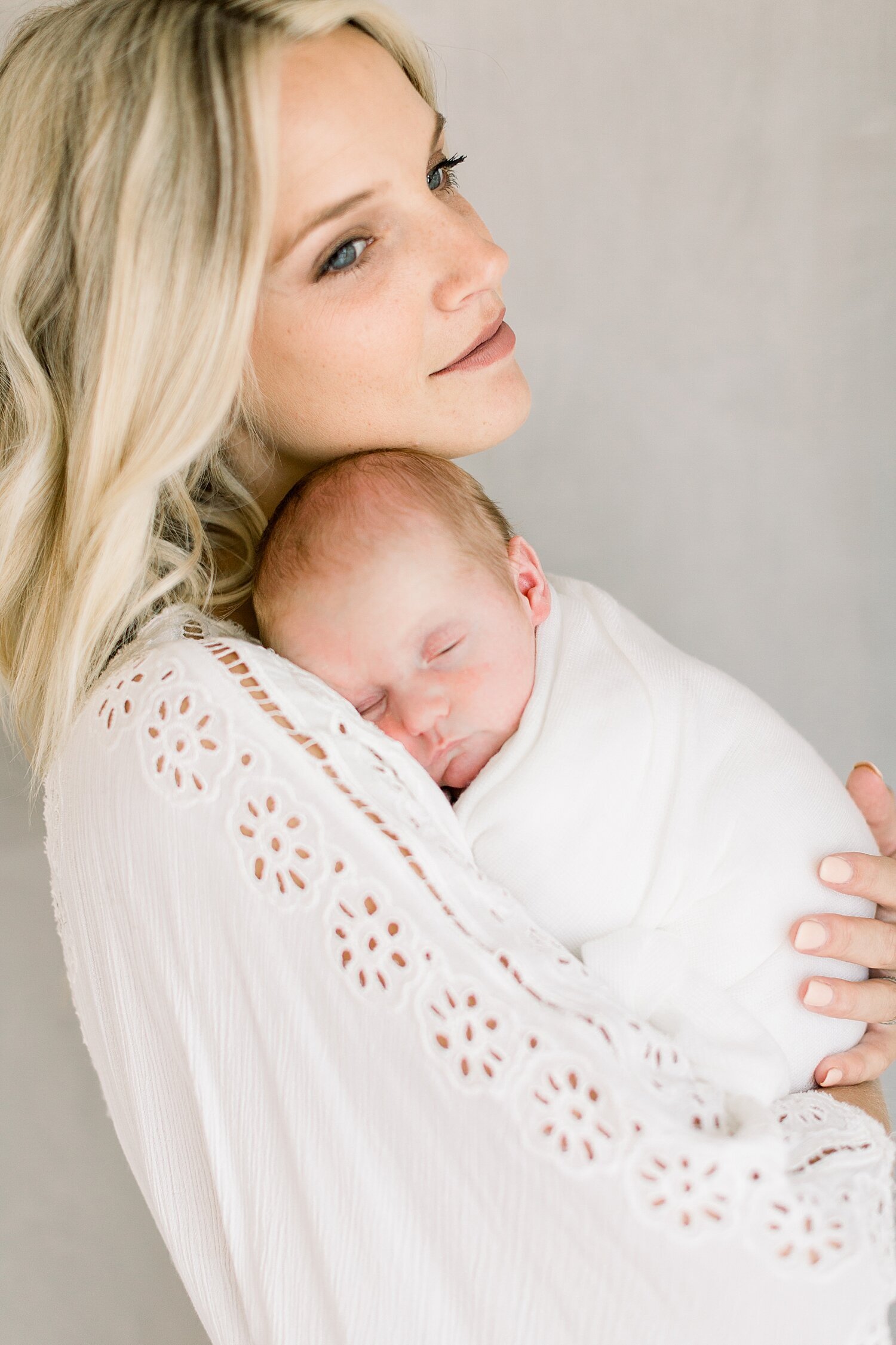 Motherhood photo of mom with baby boy | Photos by Newport Beach Newborn Photographer, Ambre Williams Photography.