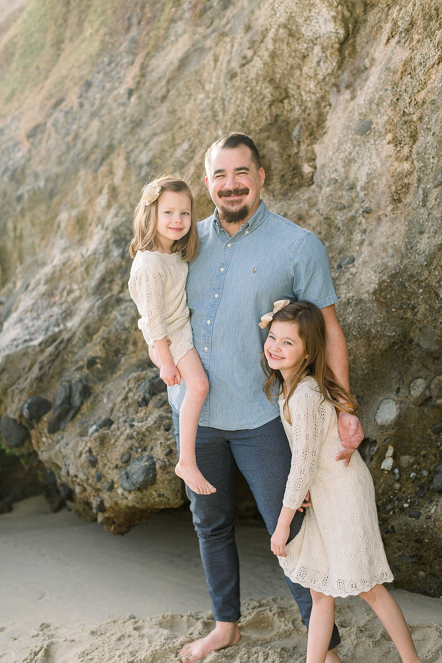 Dad and his two girls in front of the coastal bluffs. Photos by Ambre Williams Photography.