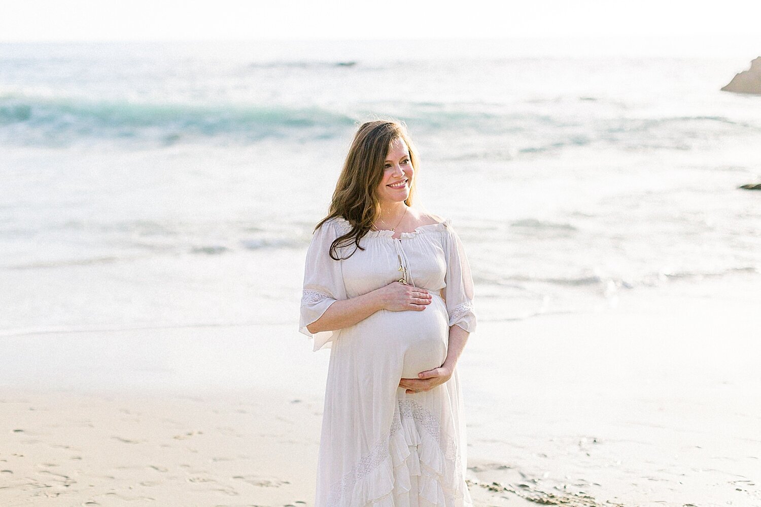 Beach maternity session at Corona del Mar. Photos by Ambre Williams Photography.