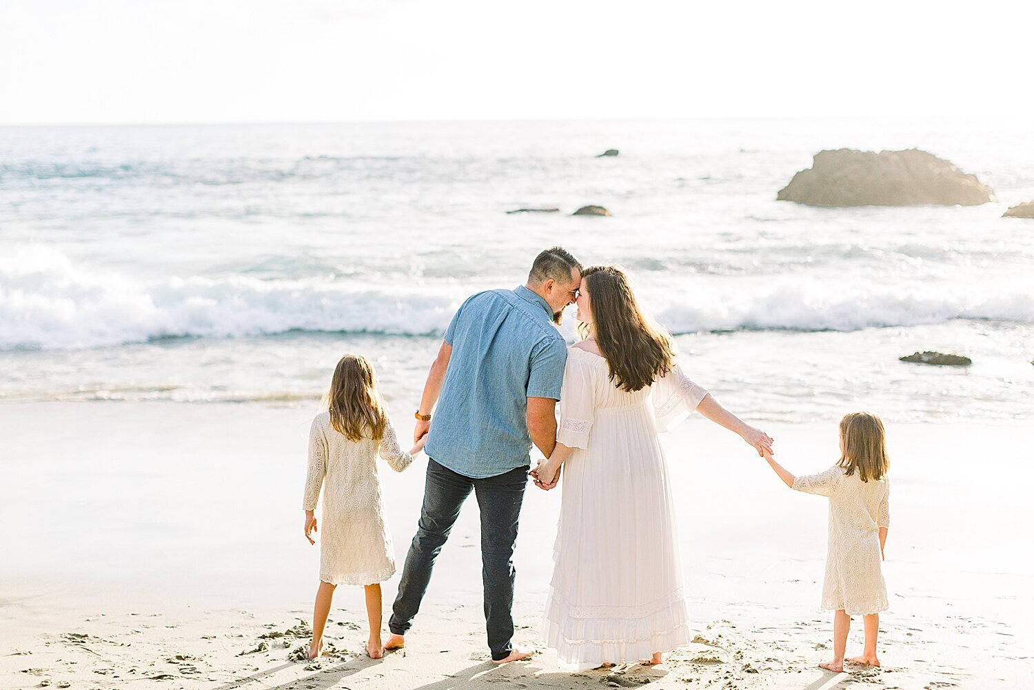 Family photo during maternity photoshoot with Ambre Williams Photography in Newport Beach, CA. 