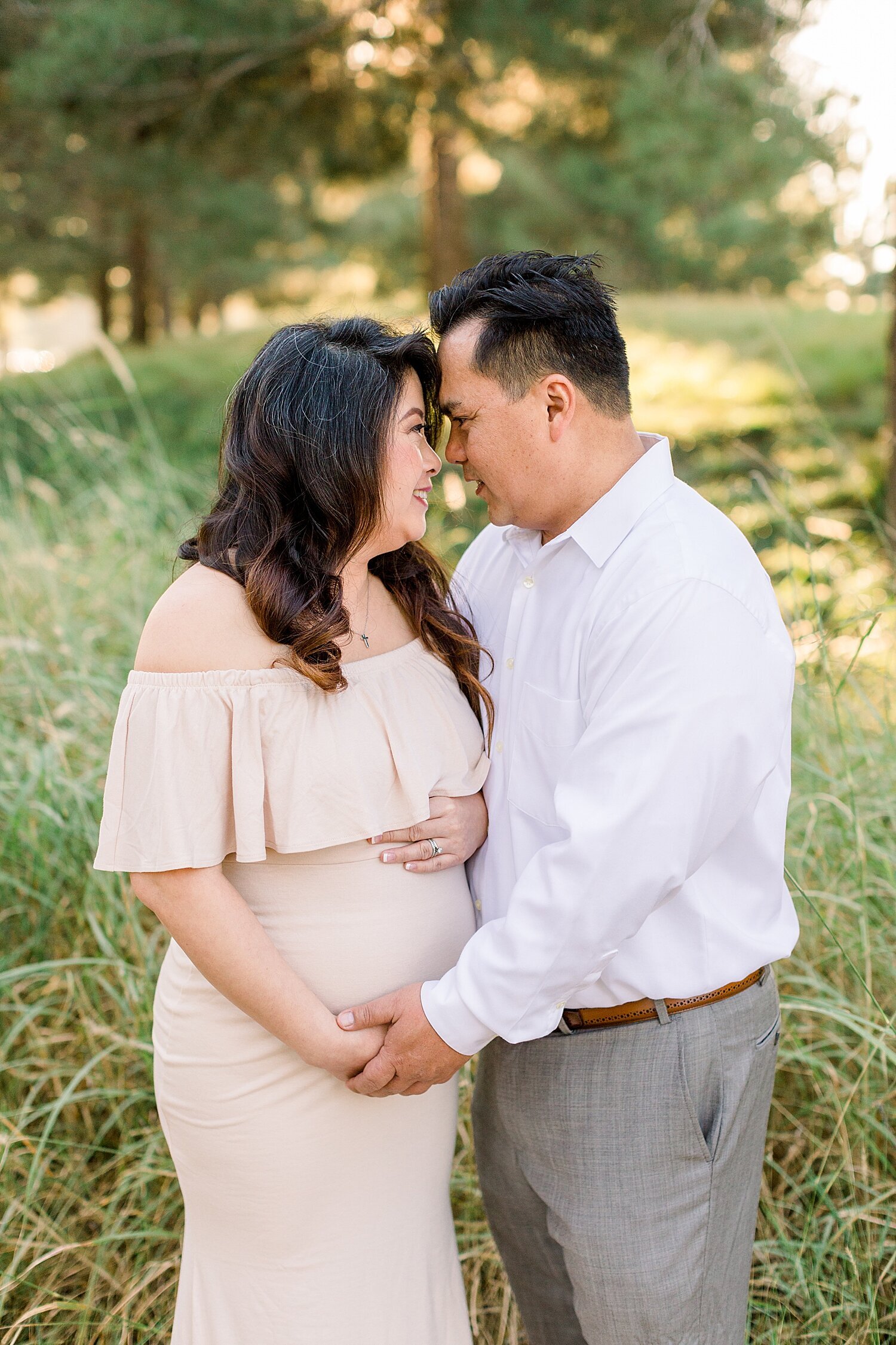Couple takes maternity photos at Jeffrey Open Space Trail in Irvine, CA. Photos by Ambre Williams Photography.