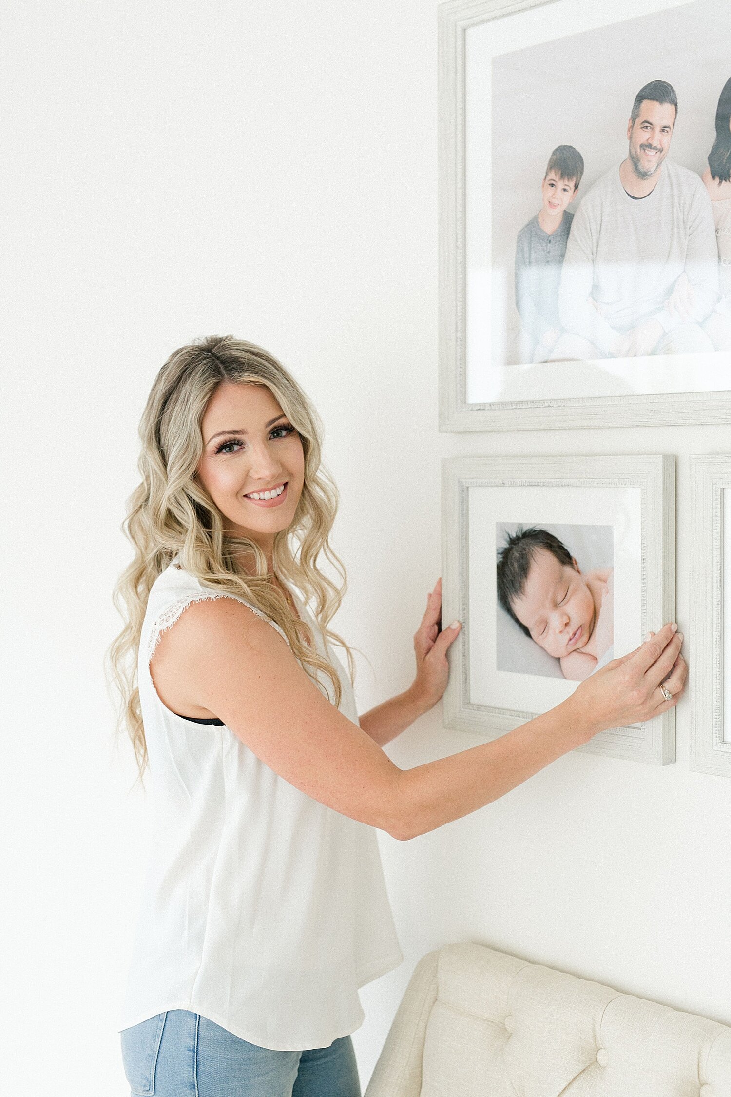 Custom framing and installation of newborn session with Newport Beach photographer, Ambre Williams Photography.