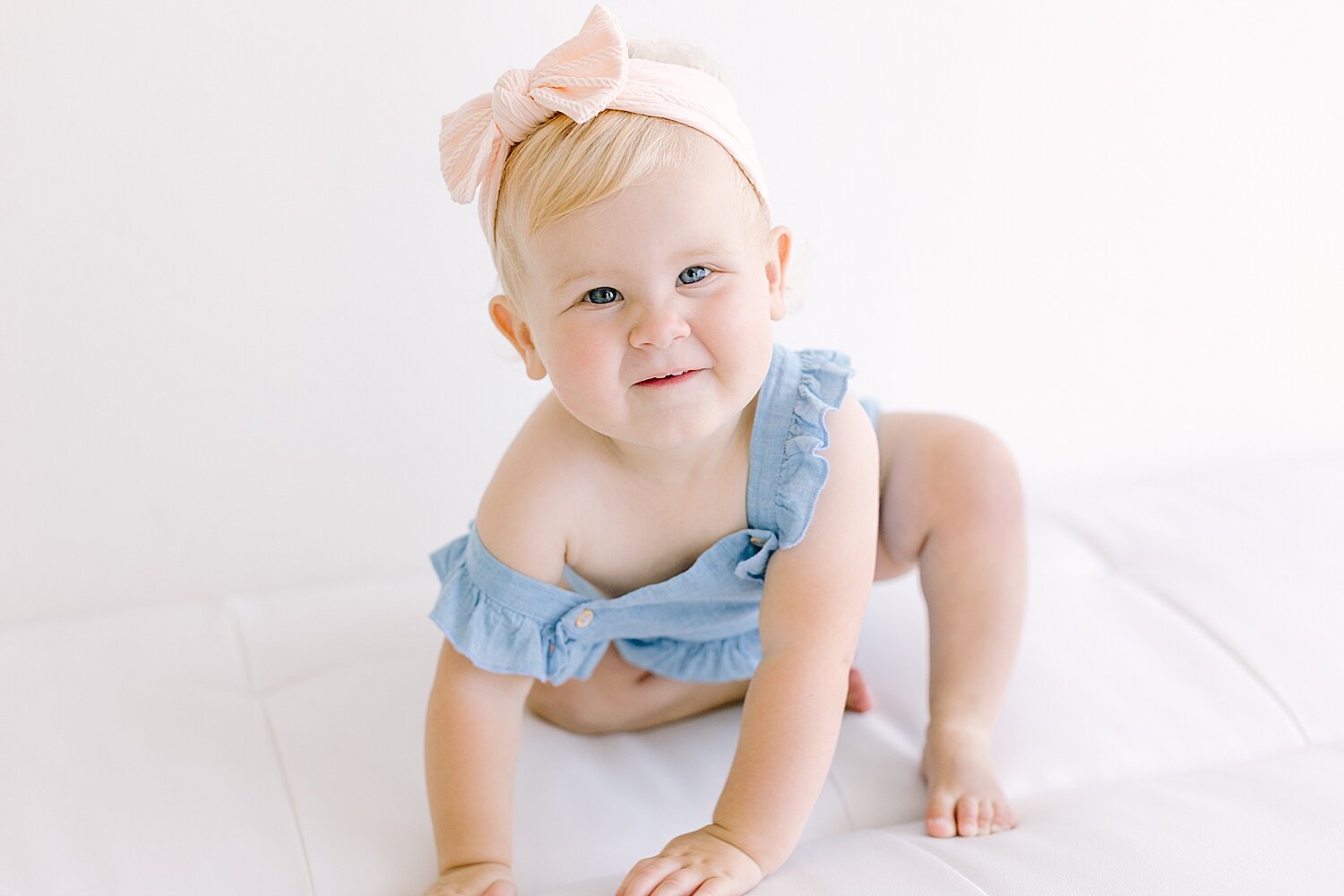 One year old baby girl in Newport Beach studio for first birthday session with Ambre Williams Photography.