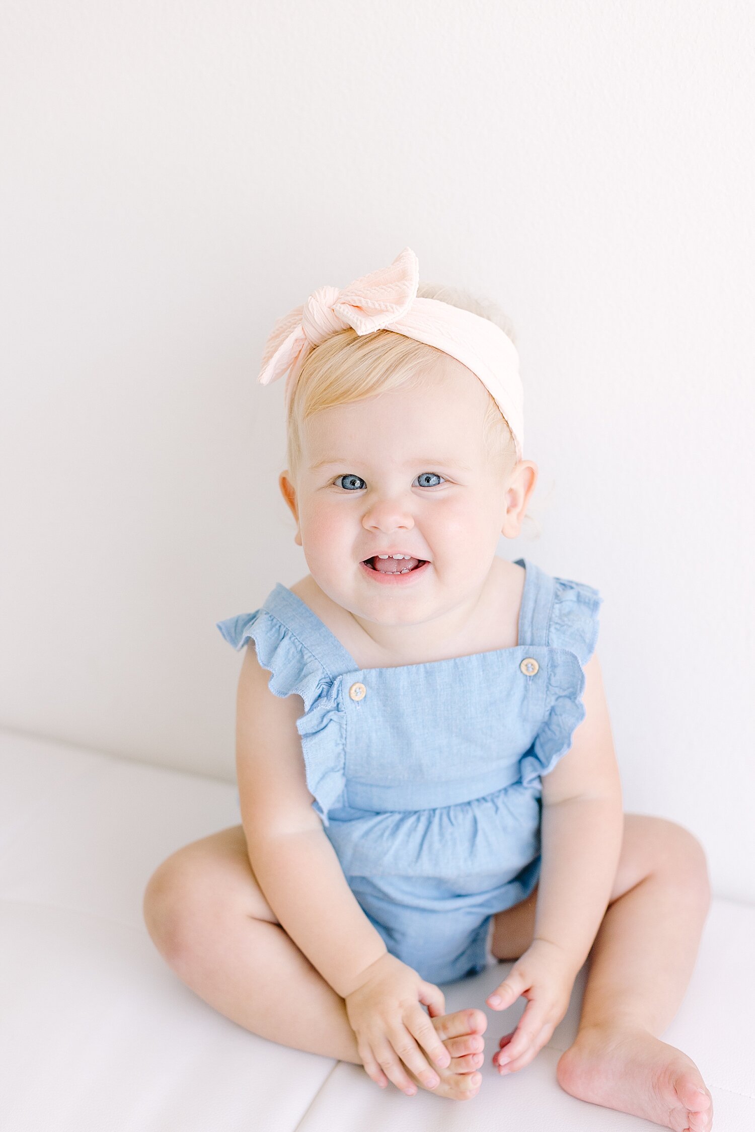 One year old baby girl in Newport Beach studio for first birthday session with Ambre Williams Photography.