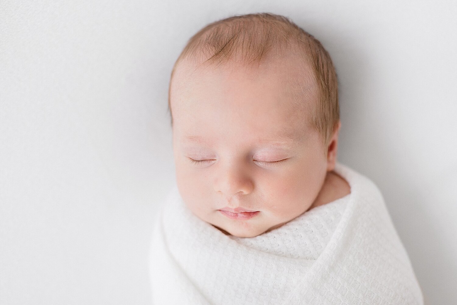 Newborn baby boy sleeping | Ambre Williams Photography