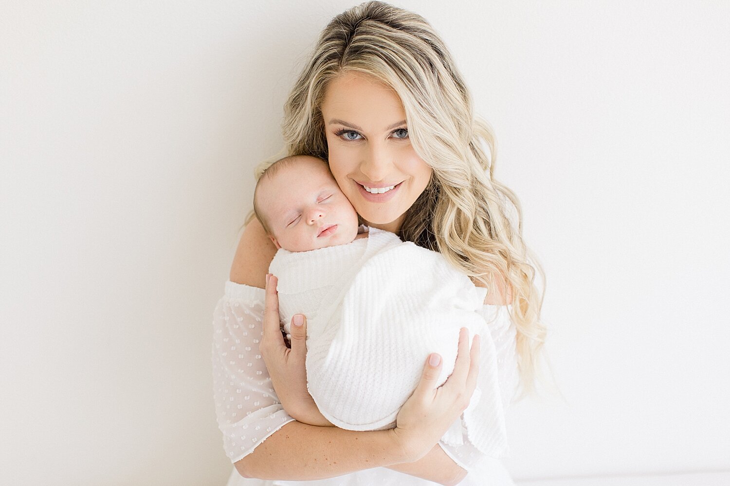 Mom snuggling her baby boy | Ambre Williams Photography