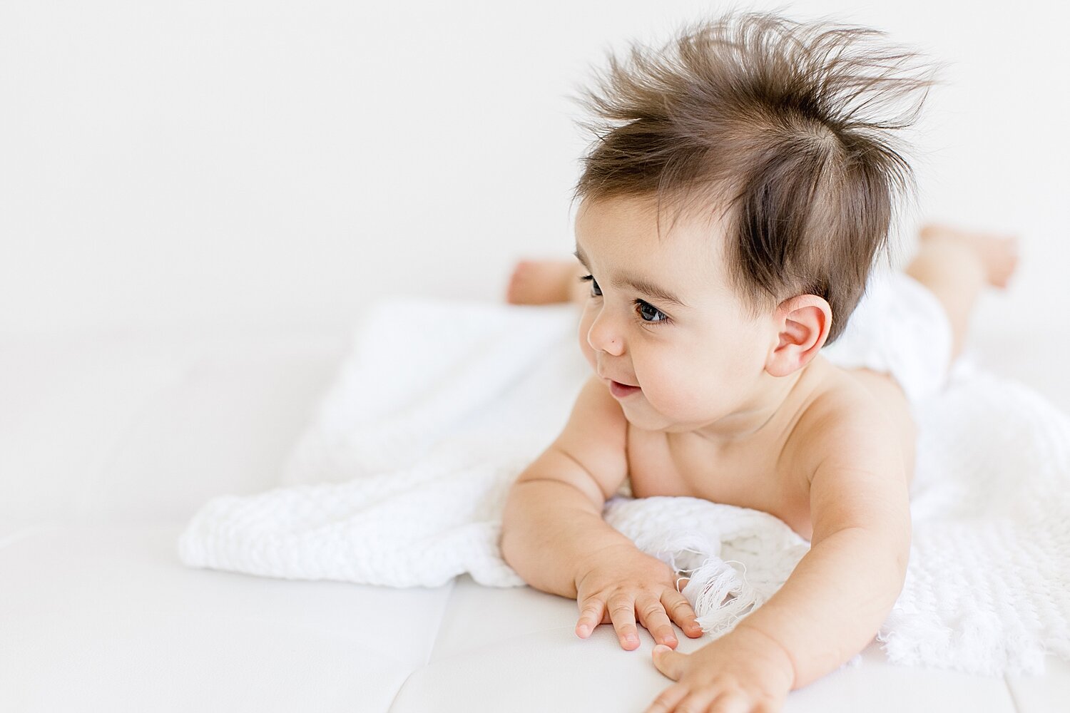 Six month old milestone session in studio in Newport Beach. Photo by Ambre Williams Photography.