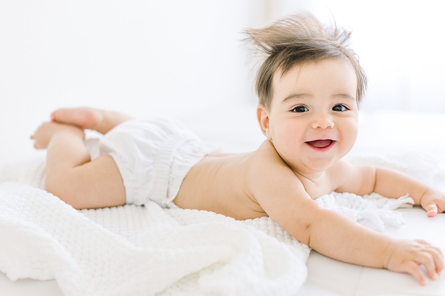 Six month old milestone session in studio in Newport Beach. Photo by Ambre Williams Photography.