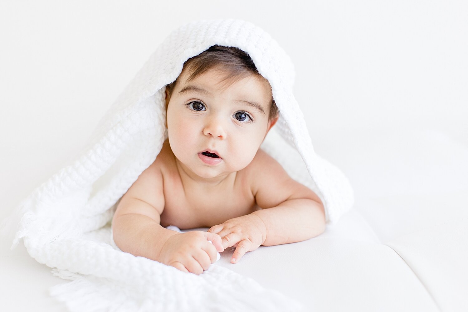 Six month old milestone session in studio in Newport Beach. Photo by Ambre Williams Photography.