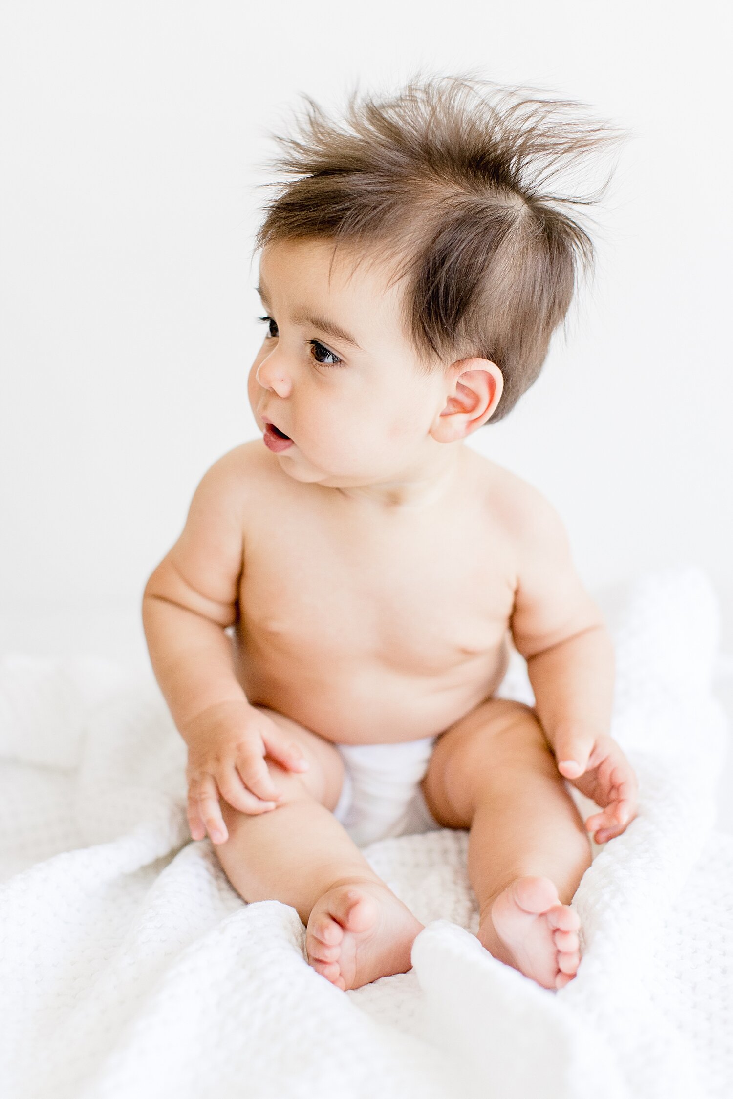 Six month old milestone session in studio in Newport Beach. Photo by Ambre Williams Photography.