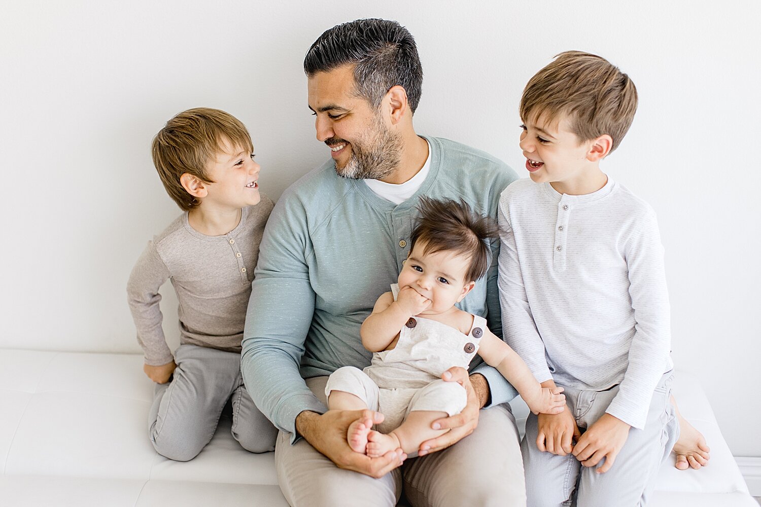 Dad and his three boys | Photo by Ambre Williams Photography