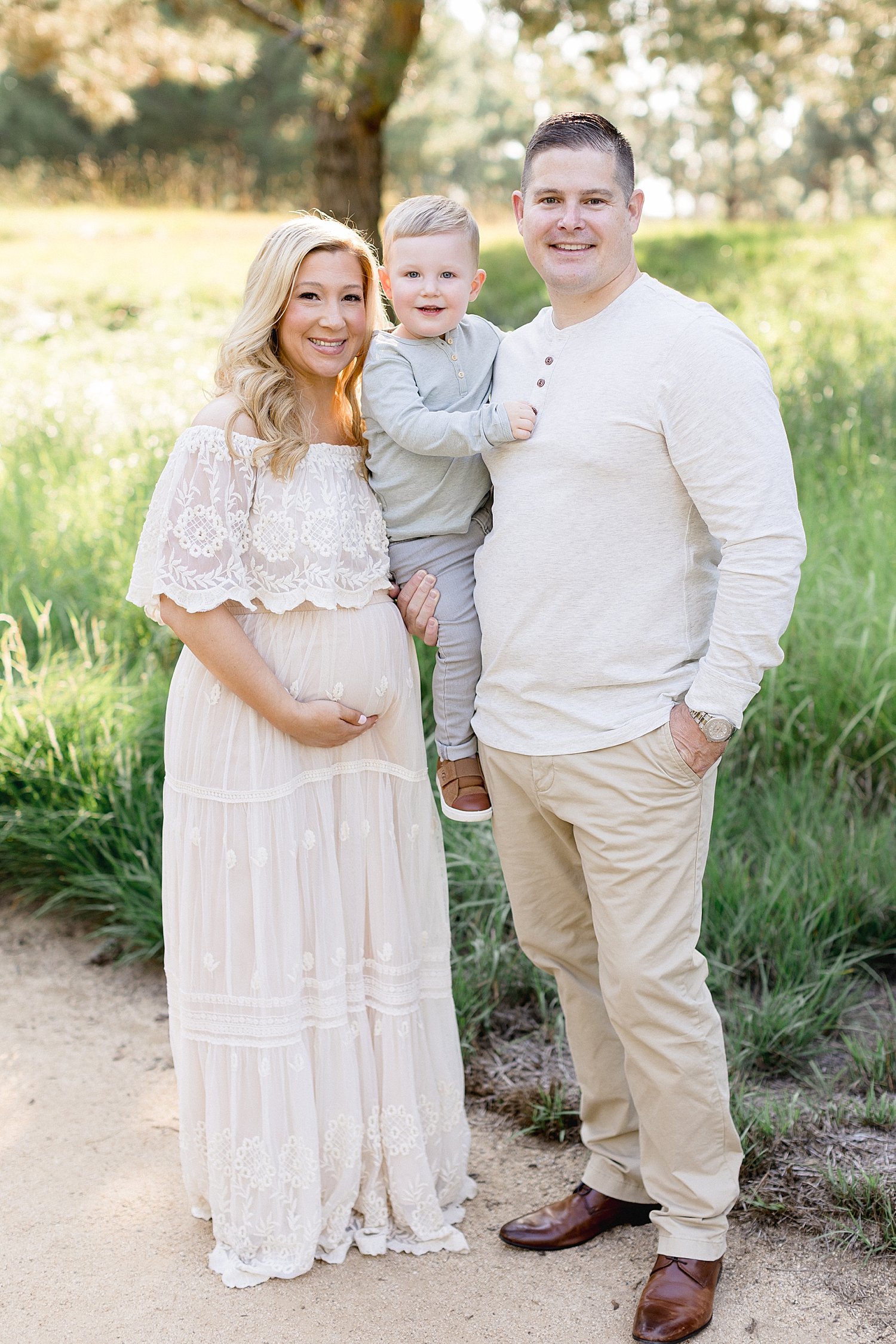 Family portrait during maternity session with Ambre Williams Photography.