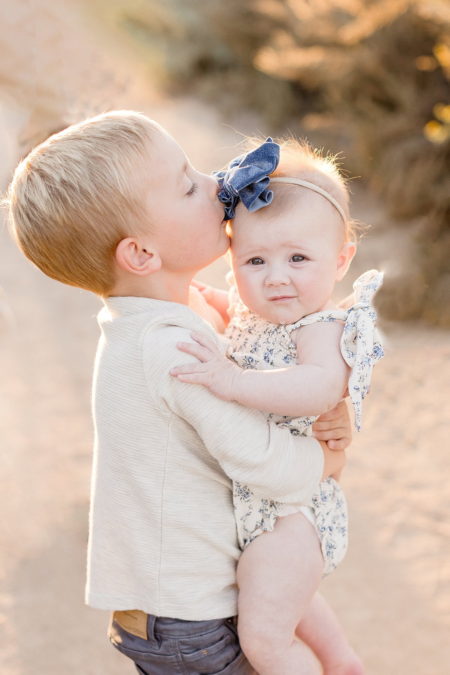 Brother and sister hugging | Ambre Williams Photography