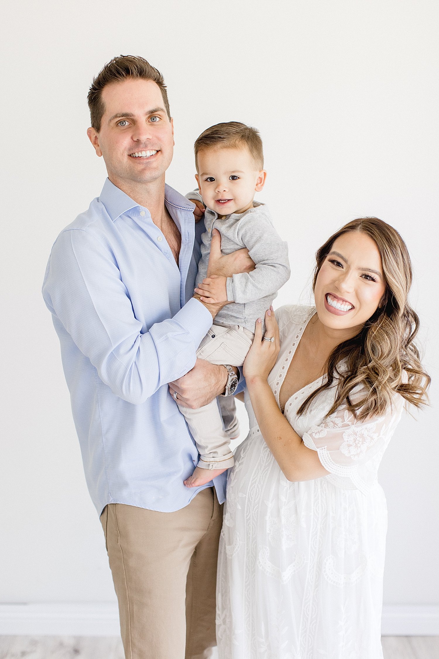 Mom, dad and toddler at maternity photoshoot with Ambre Williams Photography.