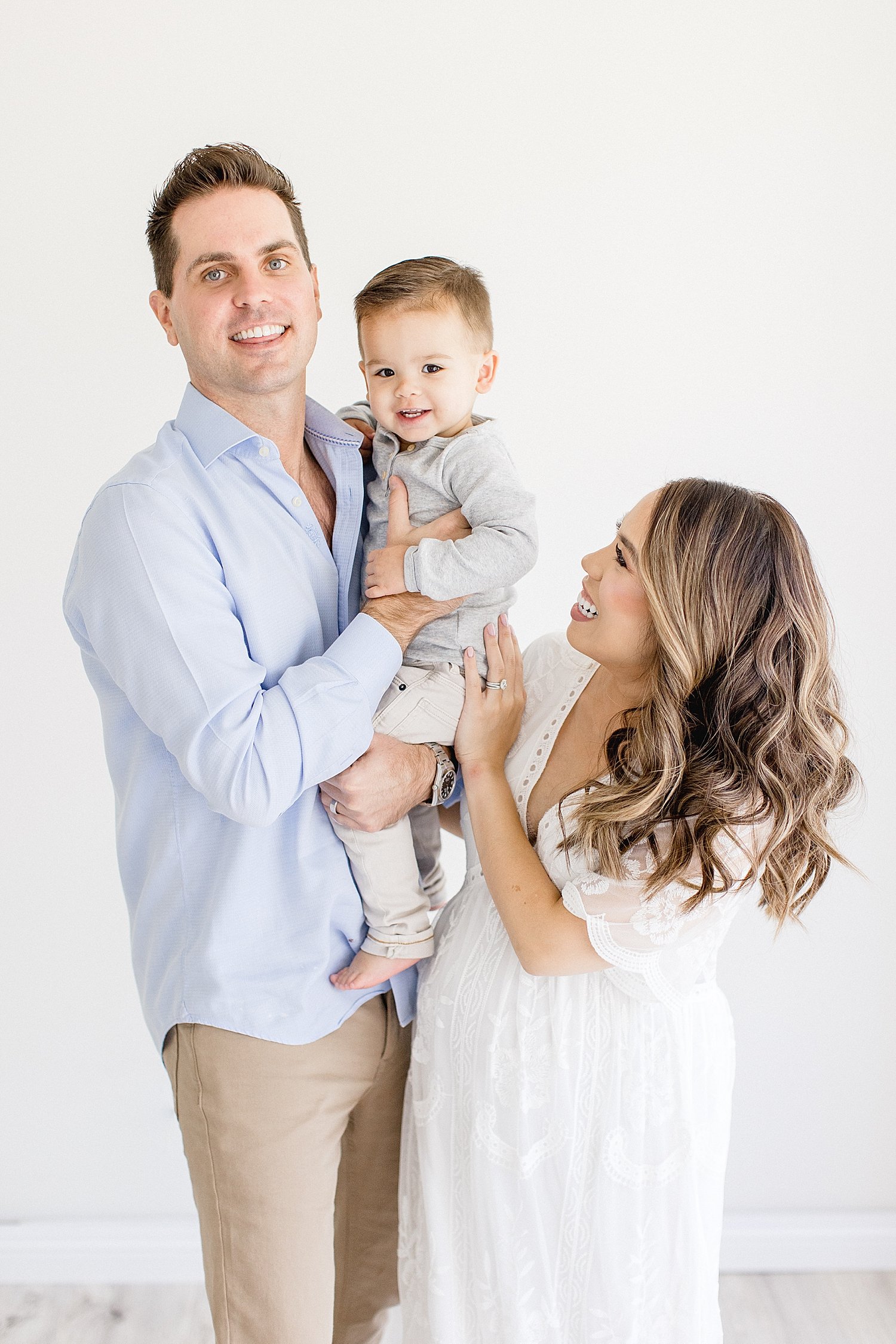 Mom, dad and toddler at maternity photoshoot with Ambre Williams Photography.