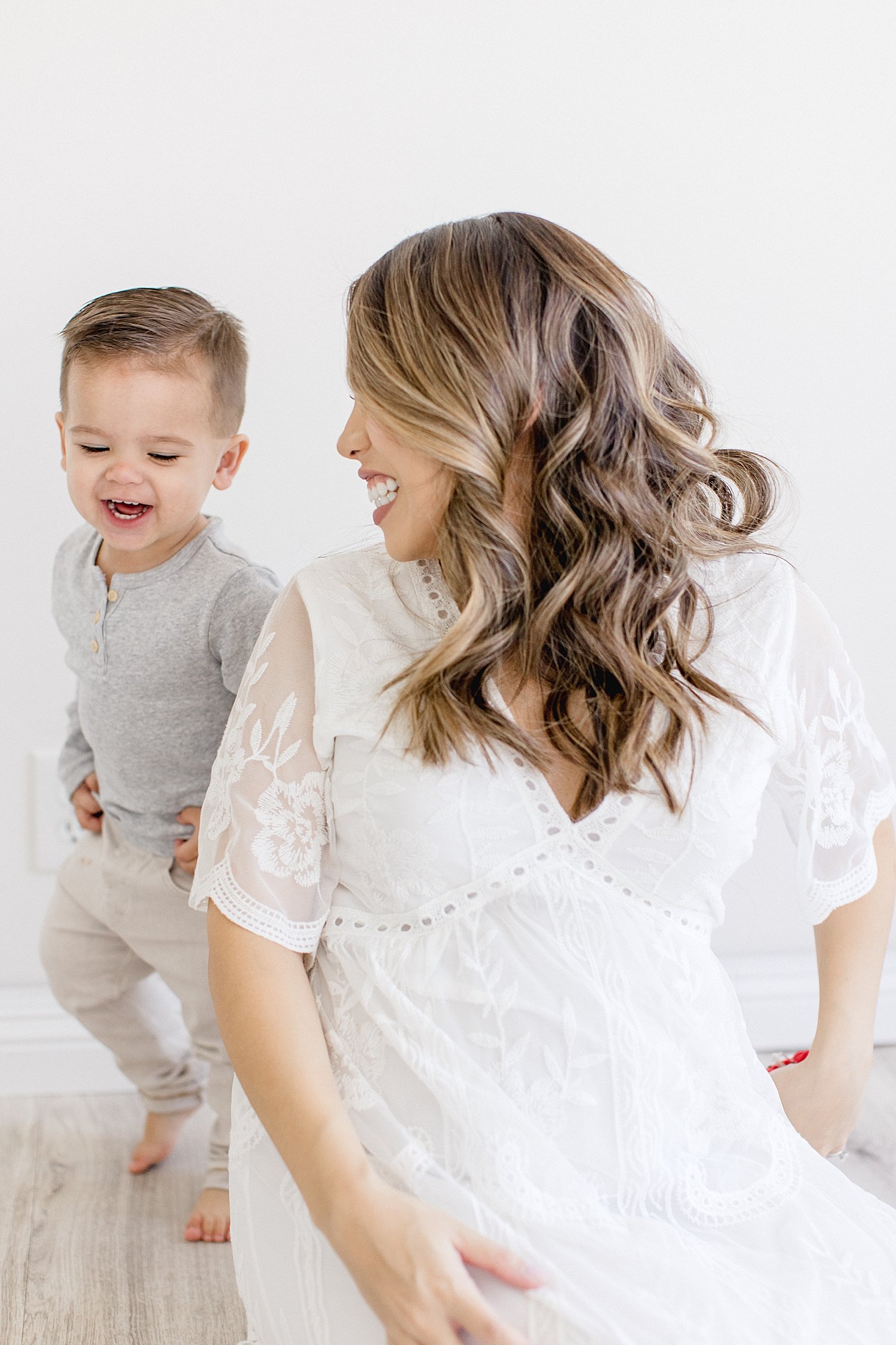 Toddler running around Mom | Ambre Williams Photography