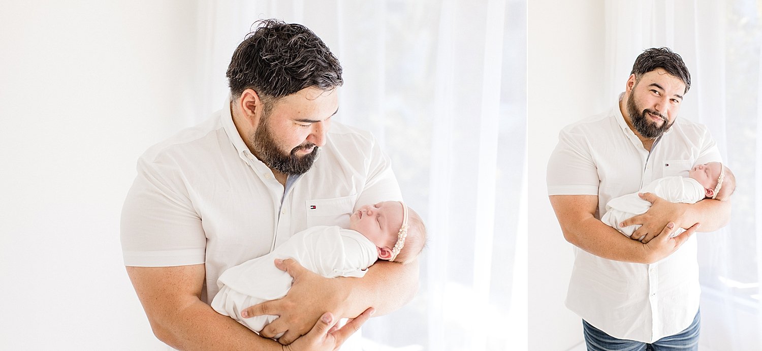 Dad holding his baby girl | Ambre Williams Photography