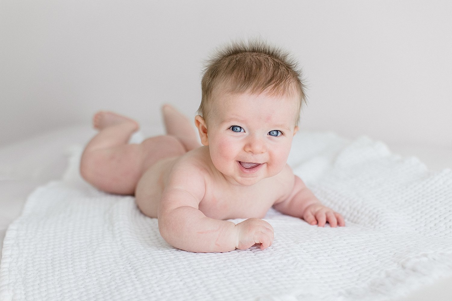 Six month old baby boy in studio for milestone session | Ambre Williams Photography