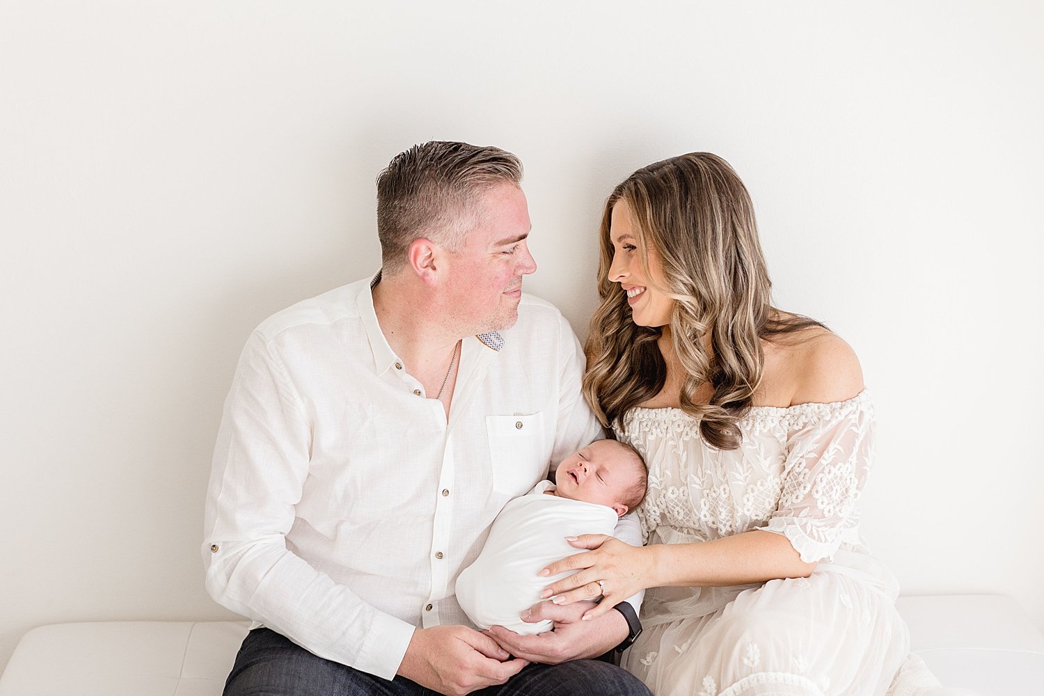 Mom and Dad with their newborn baby boy | Ambre Williams Photography