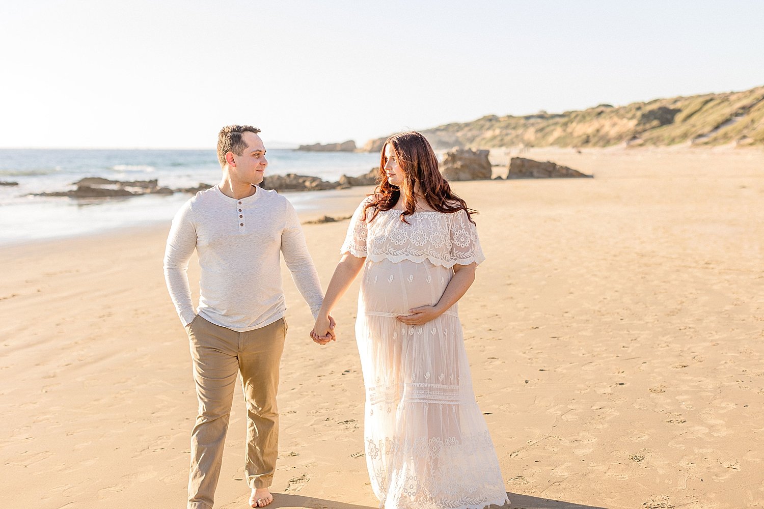 Beach maternity session for expecting parents | Ambre Williams Photography