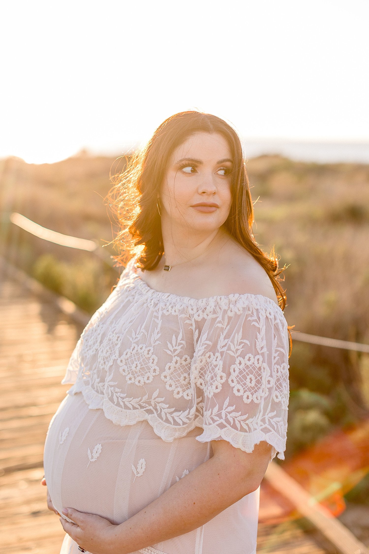 Mama-to-be during golden hour at Crystal Cove | Ambre Williams Photography