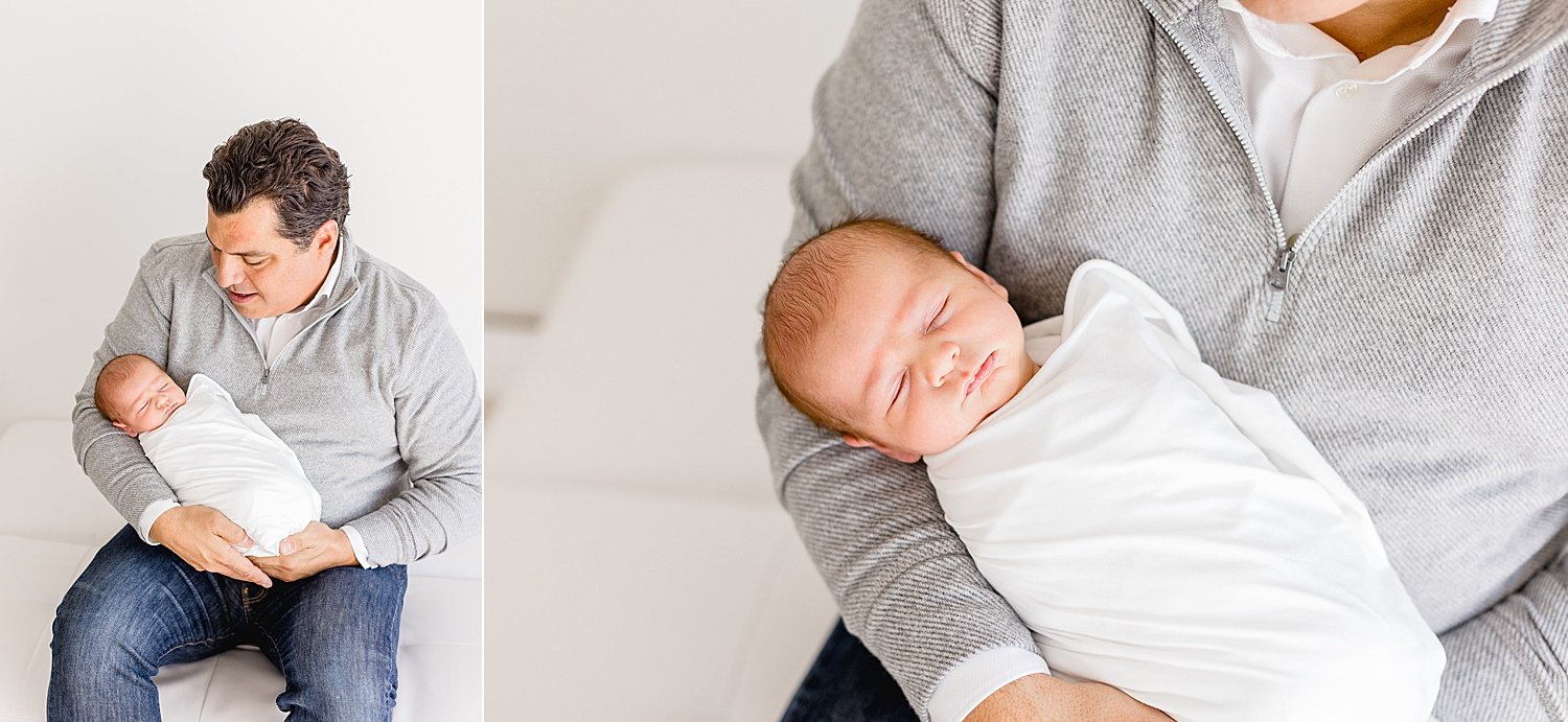 Father-son photos during newborn photoshoot with Ambre Williams Photography.