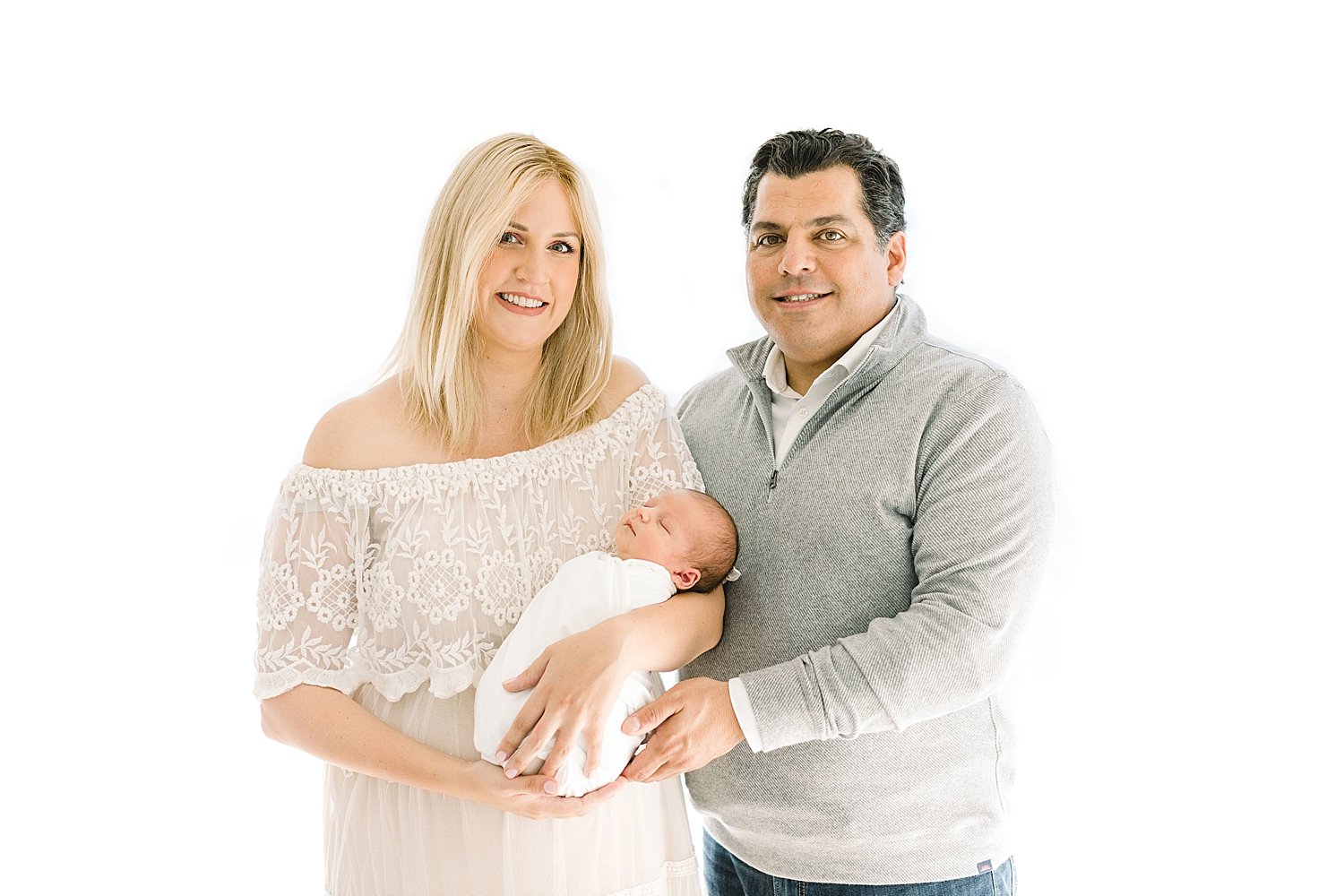Mom and Dad with newborn son | Ambre Williams Photography