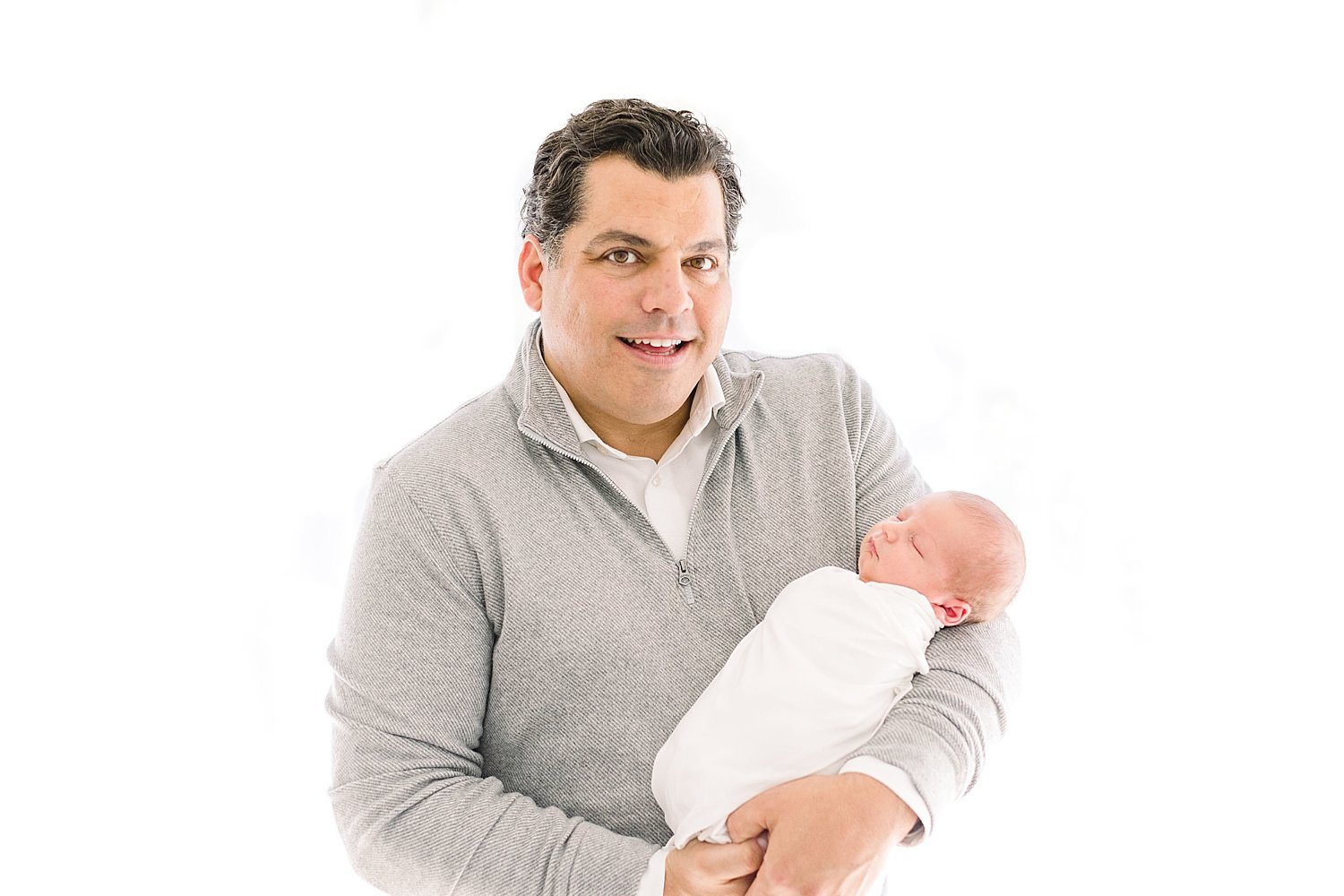 Dad with newborn son | Ambre Williams Photography