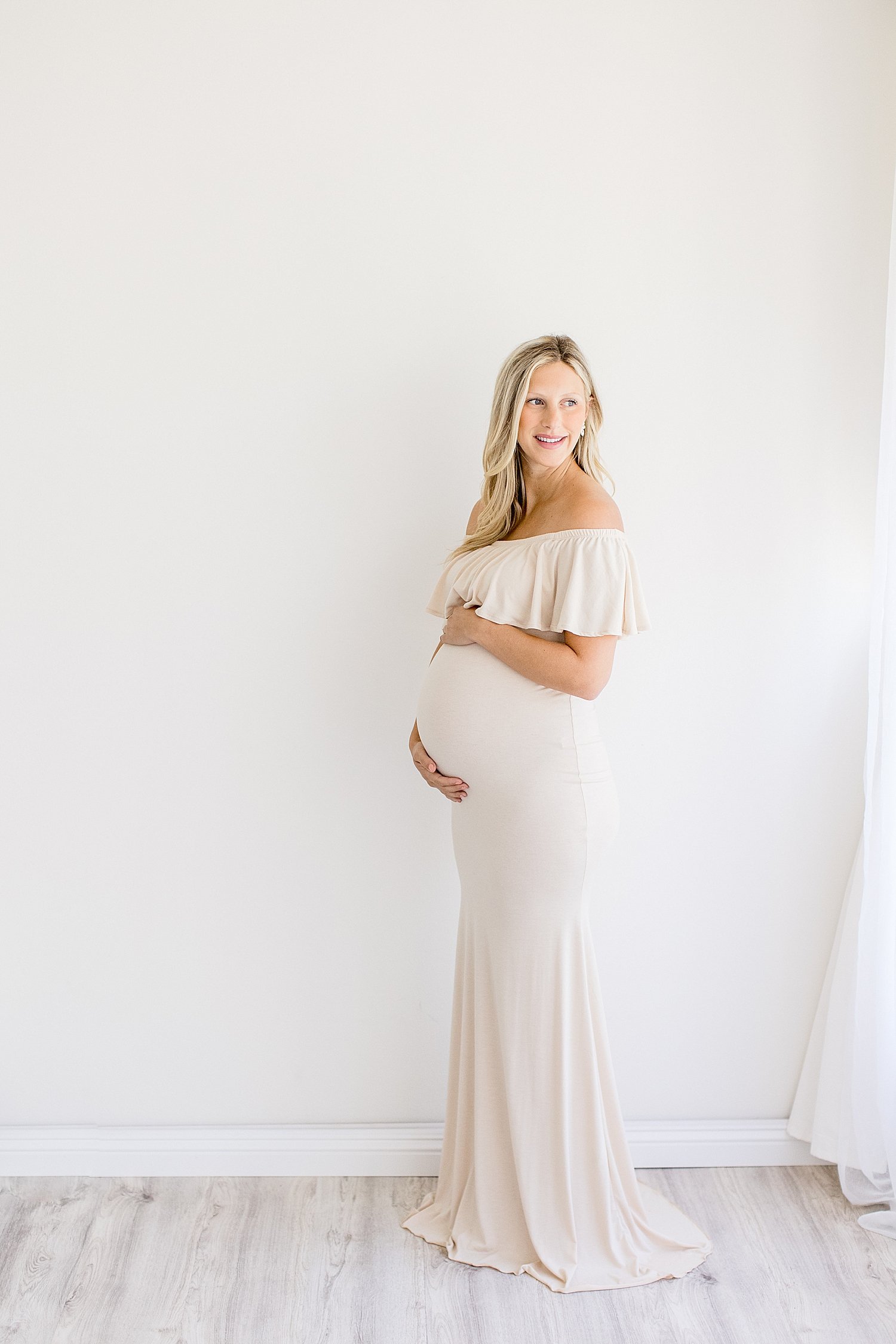 Mom in long, beautiful dress for maternity photoshoot | Ambre Williams Photography