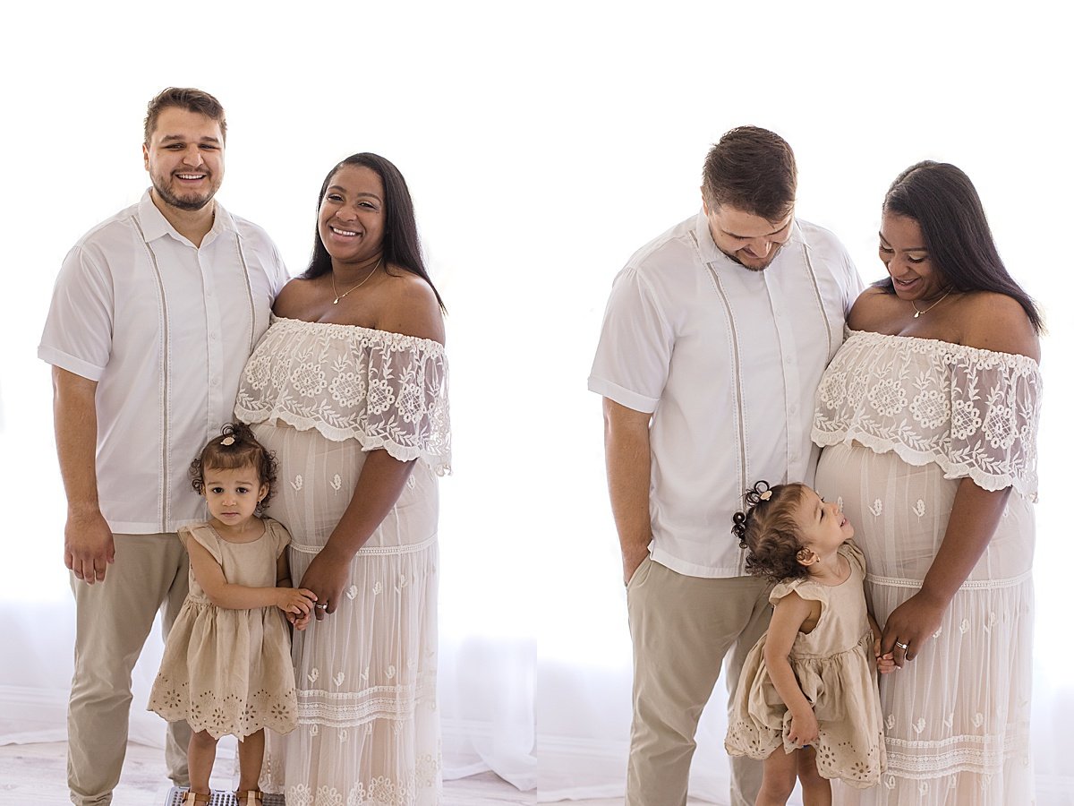 Studio Family Portraits with candid featuring mom, dad, and big sister | Ambre Williams Photography in Newport Beach