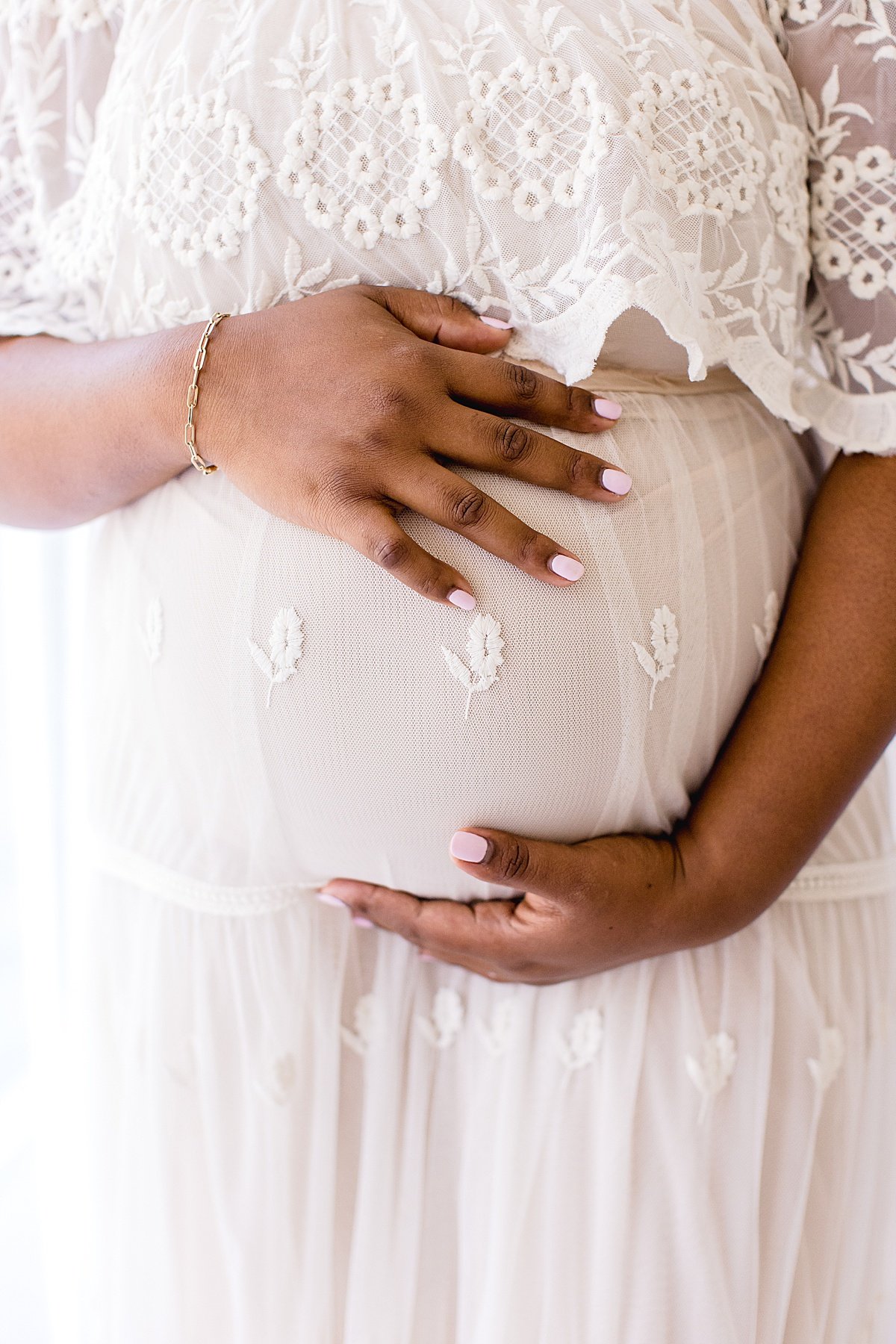 Detail Portrait of Beautiful pregnant Mom in her white lace dress in Newport Beach with Ambre Williams Photography