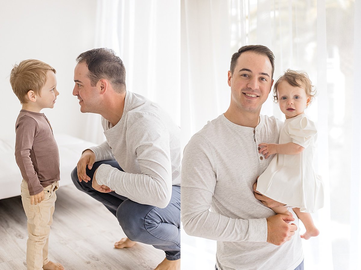 Dad taking candid portrait with his son and Dad smiling at the camera with his daughter during portrait session at Newport Beach with Ambre Williams Photography