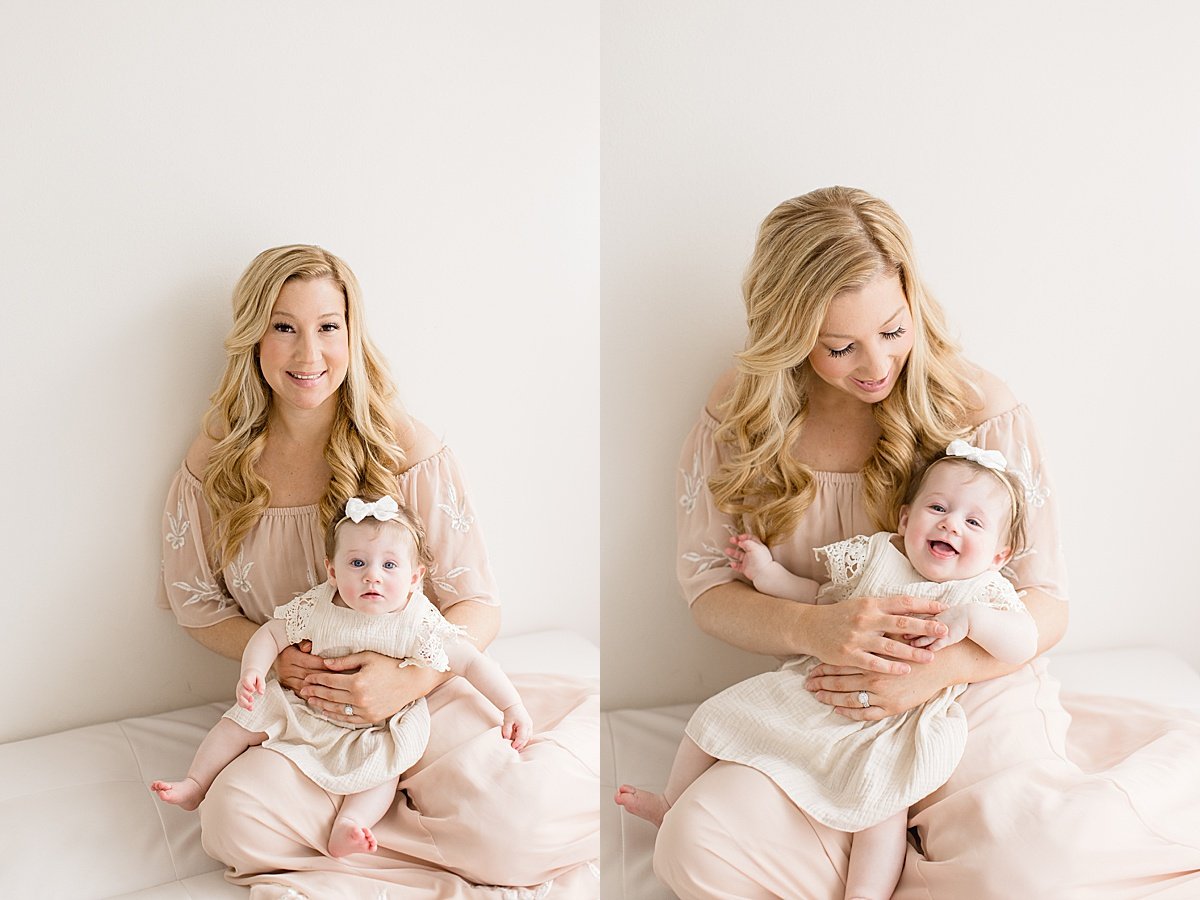 Ambre Williams Photography | Mom holding daughter during milestone session