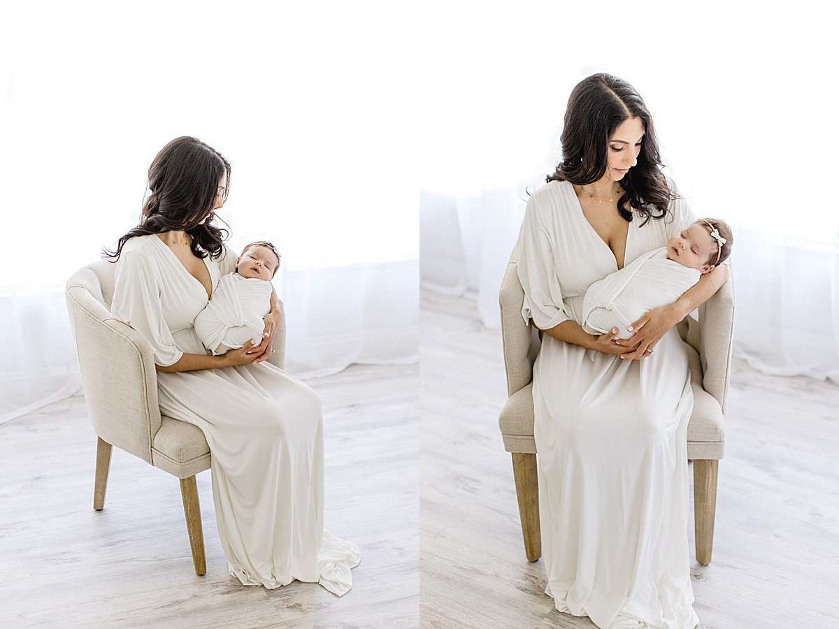 Beautiful Momma and newborn baby sitting on a chair during portrait session with Ambre Williams Photography in Newport Beach