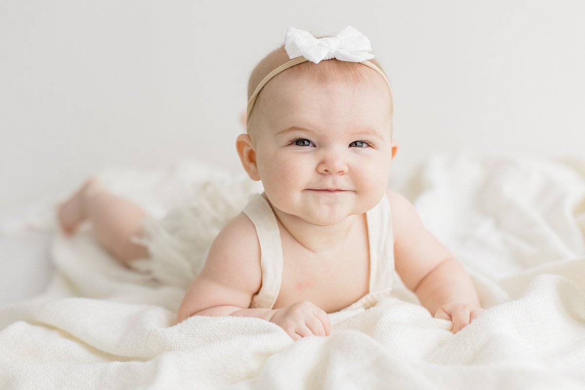 smiling baby during milestone session with Ambre Williams Photography in Newport Beach 