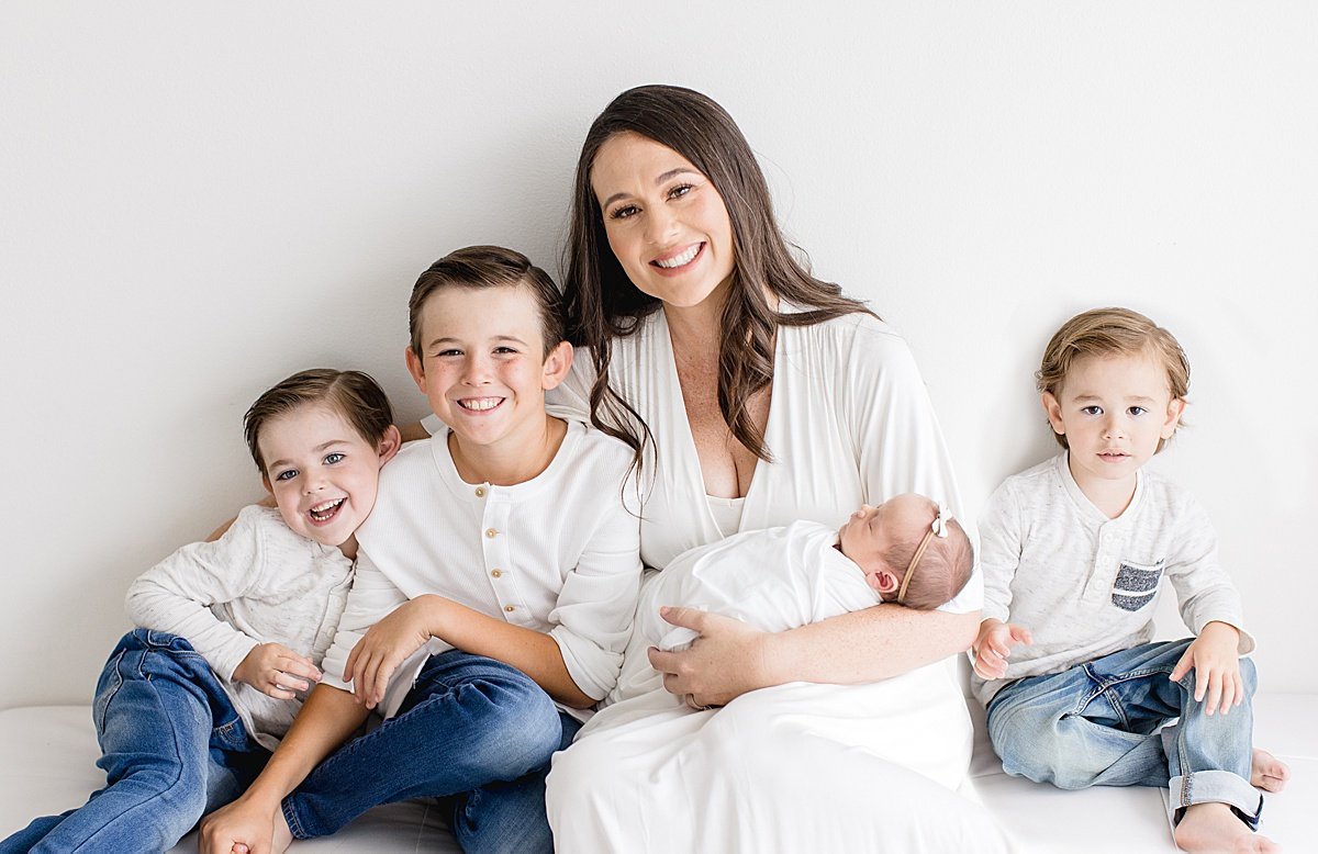 Momma smiling with her four children | Ambre Williams Photography in Newport Beach