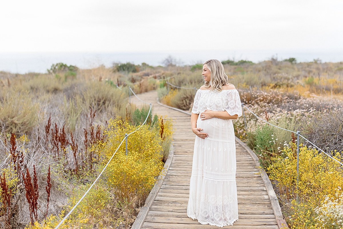 outdoor maternity portrait session on beach in newport beach california | Ambre Williams Photography