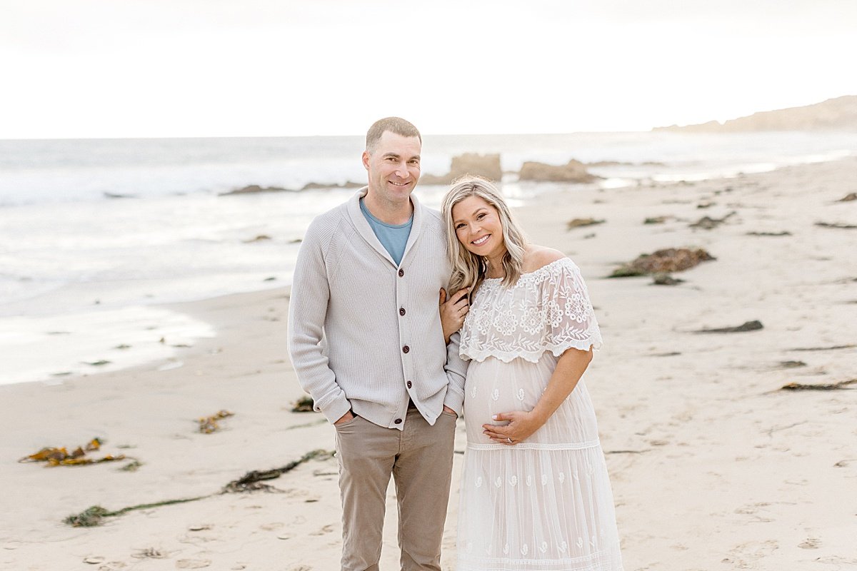 Couple photographed for maternity portrait session with Ambre Williams Photography in Newport Beach