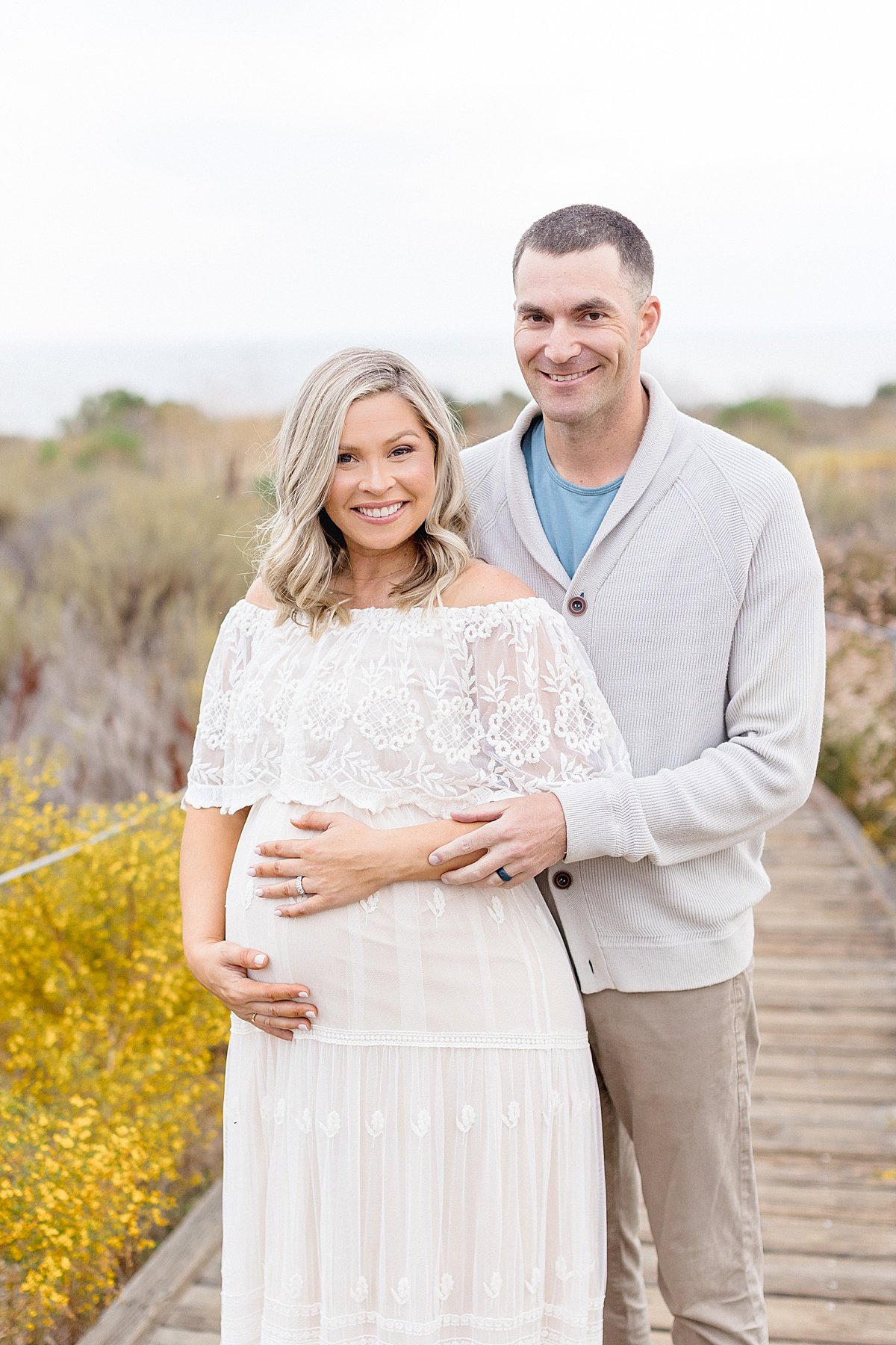 Excited Parents awaiting their first child during maternity session with Ambre Williams Photography
